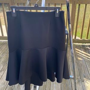 Vince Camuto assymetrical black skirt, sz M front is higher than back